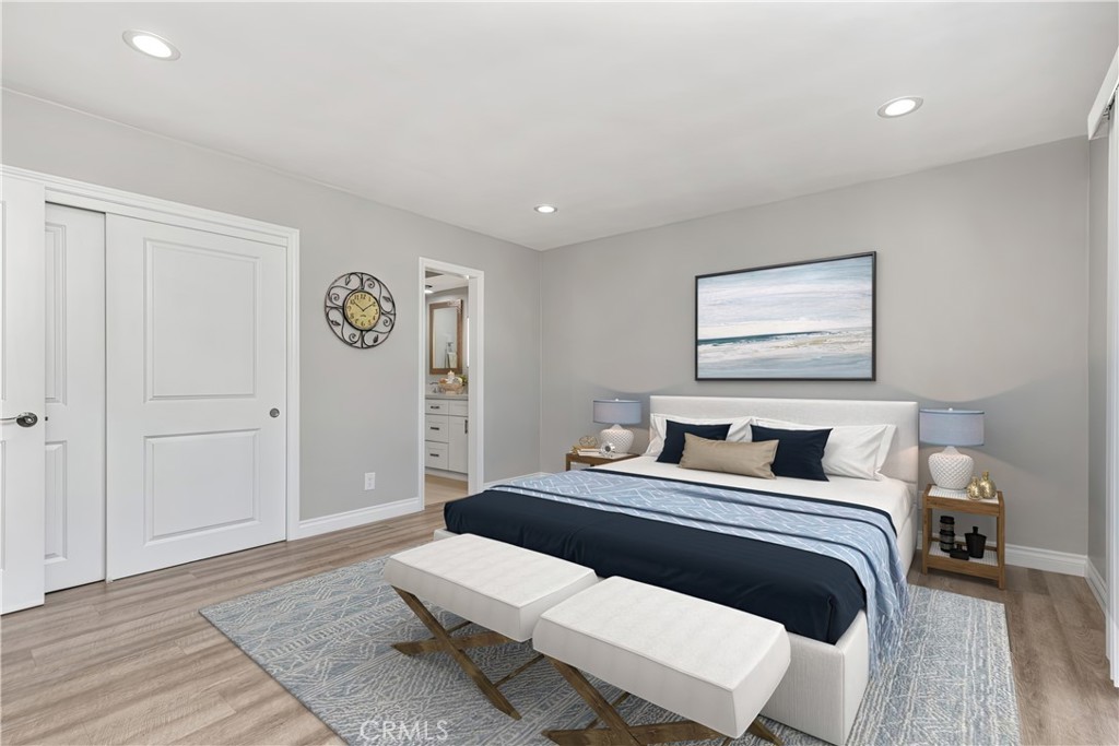 1837 North Studebaker Road Long Beach, CA 90815 - Photo 19 of 38 a bedroom with a bed and a couch