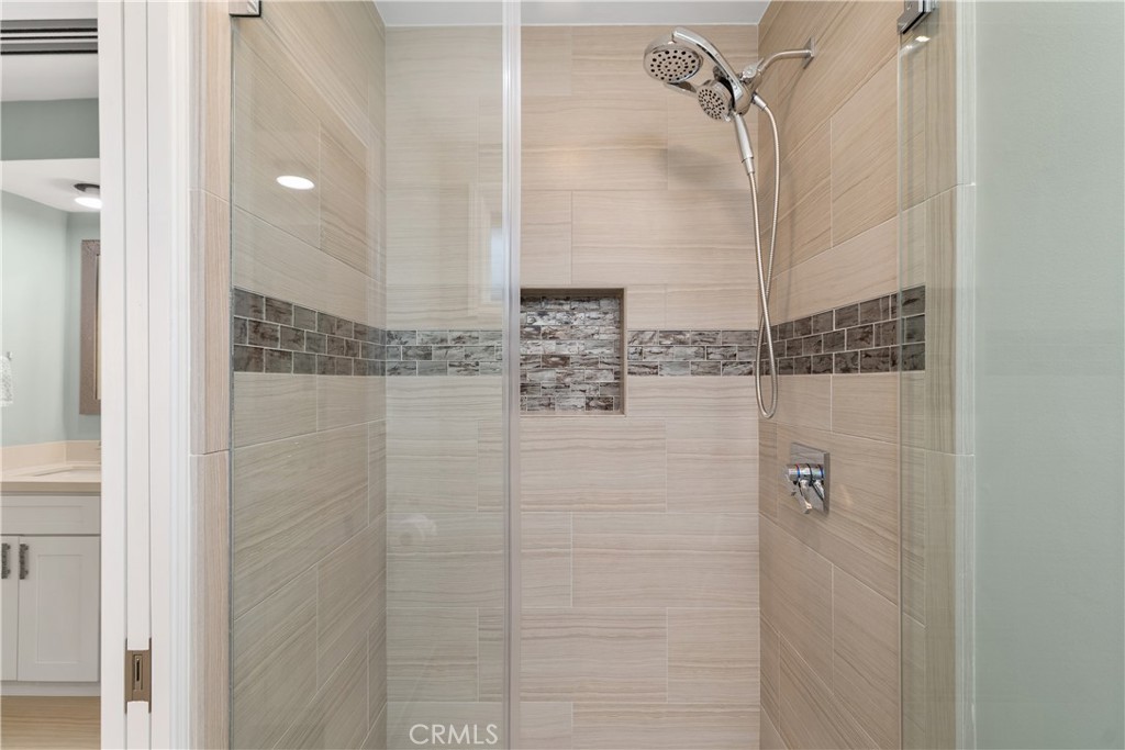 1837 North Studebaker Road Long Beach, CA 90815 - Photo 23 of 38 a bathroom with a shower