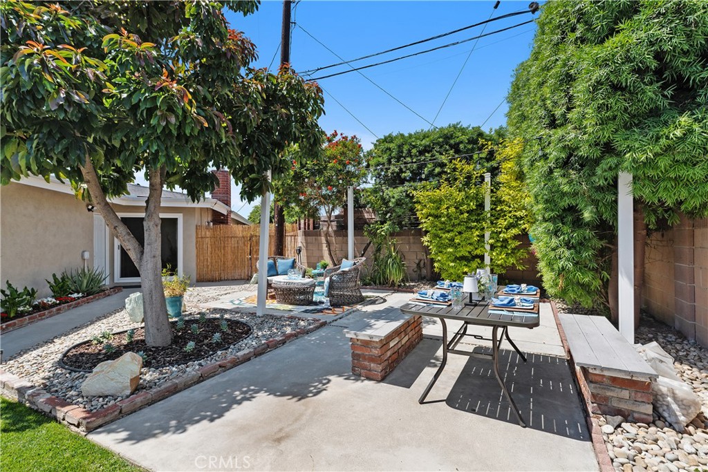 1837 North Studebaker Road Long Beach, CA 90815 - Photo 34 of 38 a view of a backyard with sitting area and furniture