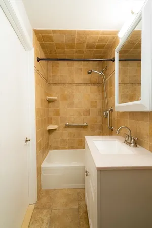 a bathroom with a sink and a bathtub