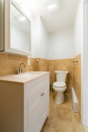 a bathroom with a sink and a toilet