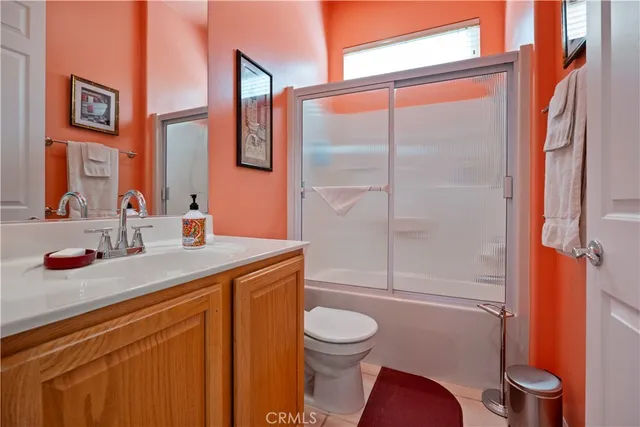 a view of a patio with a table and chairs