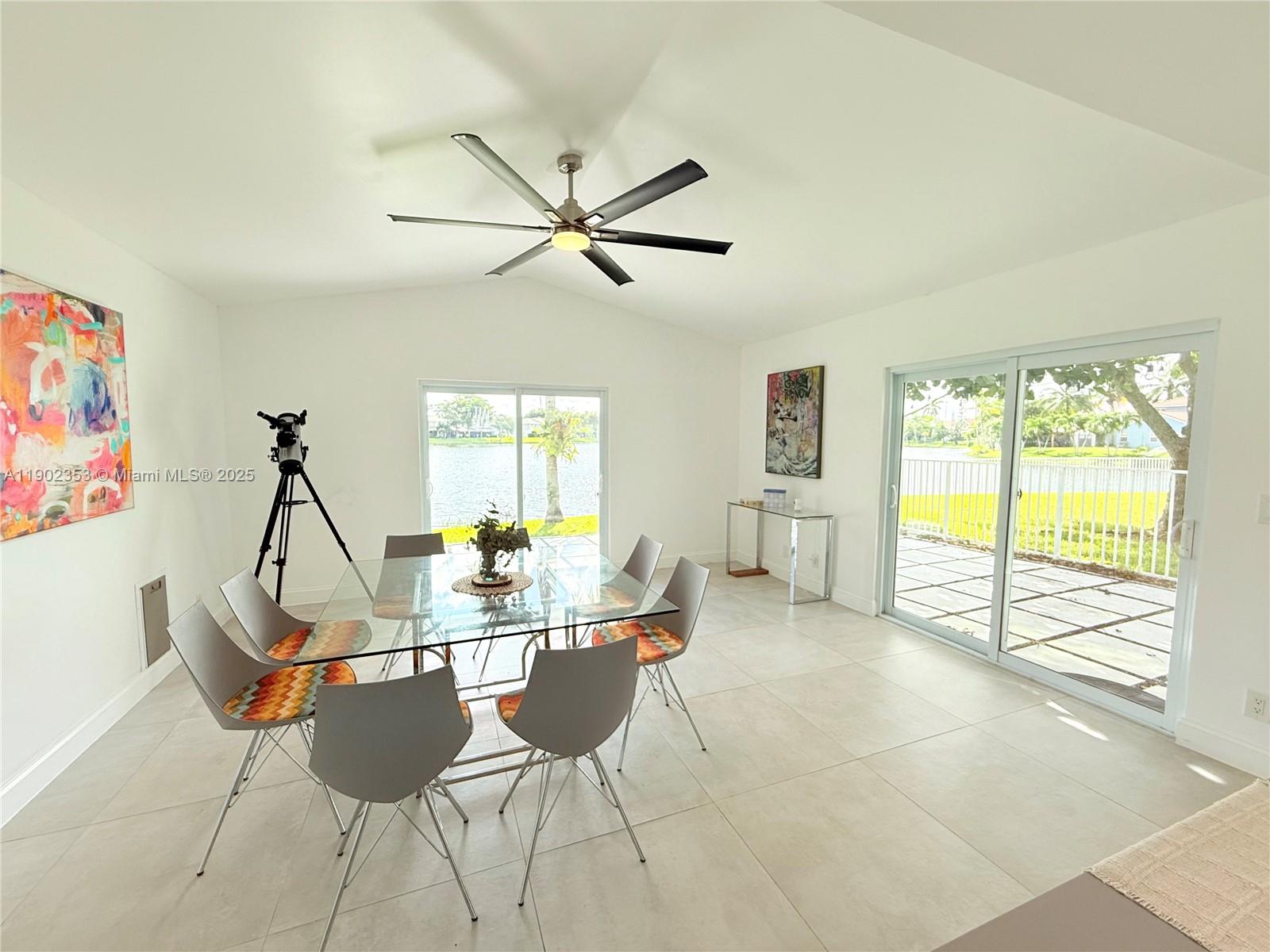 10626 Northwest 7th Street, Unit 10626 Pembroke Pines, FL 33026 - Photo 13 of 51 a view of a dining room with furniture window and outside view