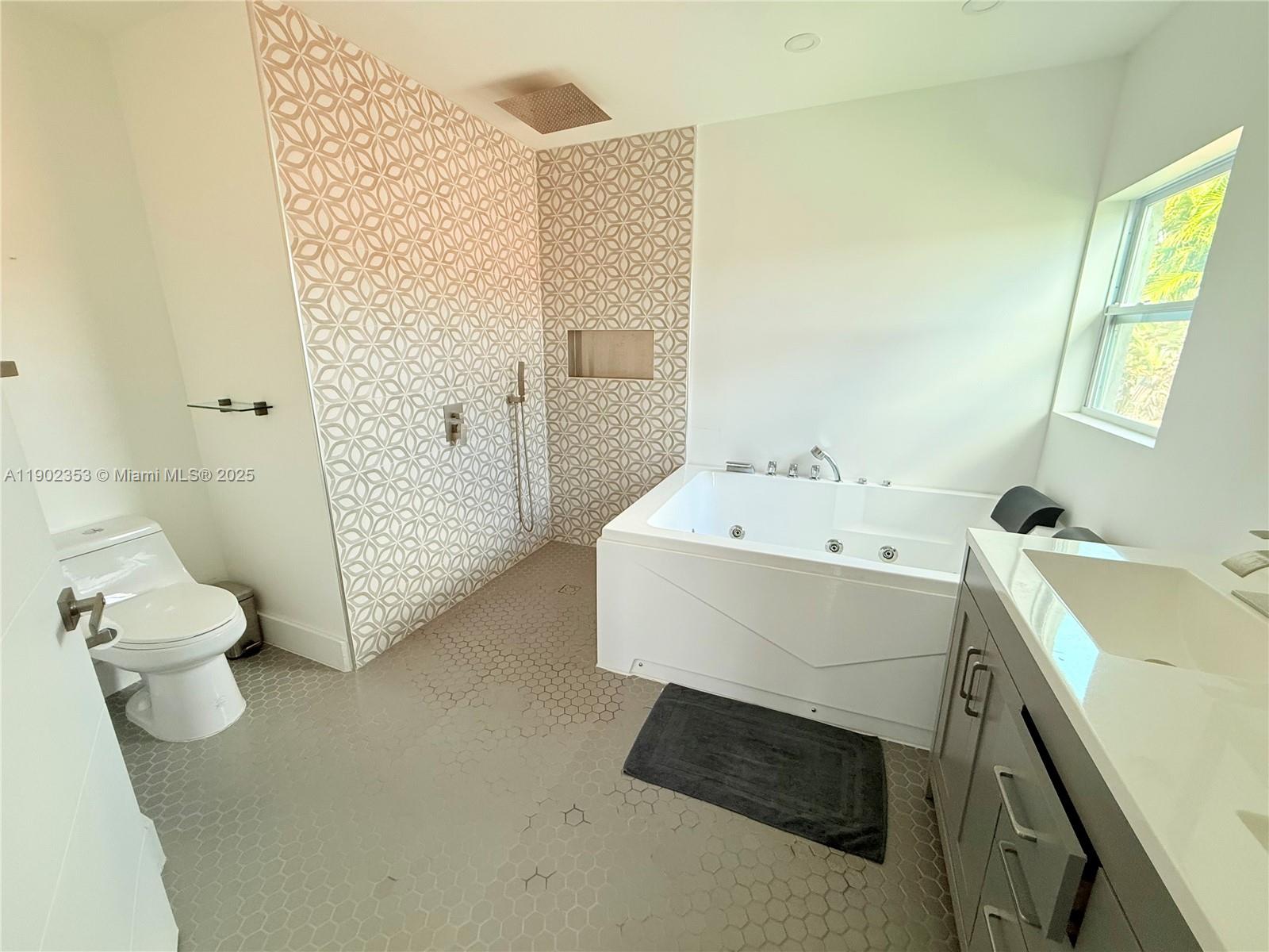 10626 Northwest 7th Street, Unit 10626 Pembroke Pines, FL 33026 - Photo 24 of 51 a bathroom with a sink and a toilet