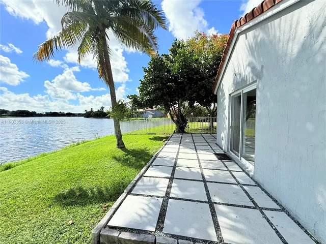 a view of a yard with an outdoor space