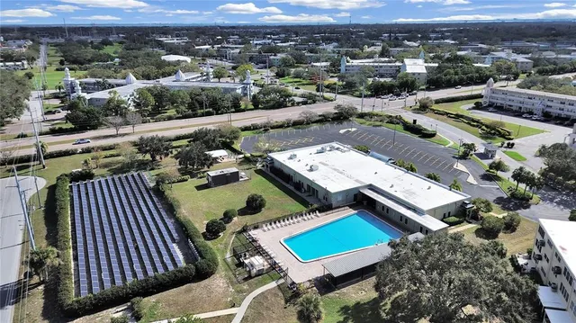 a view of swimming pool from a balcony