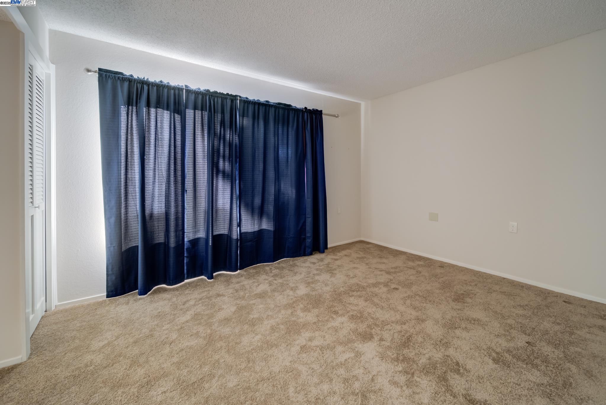 1708 Golden Rain Road, Unit 3 Walnut Creek, CA 94595 - Photo 18 of 23 a view of a room with a wooden walls
