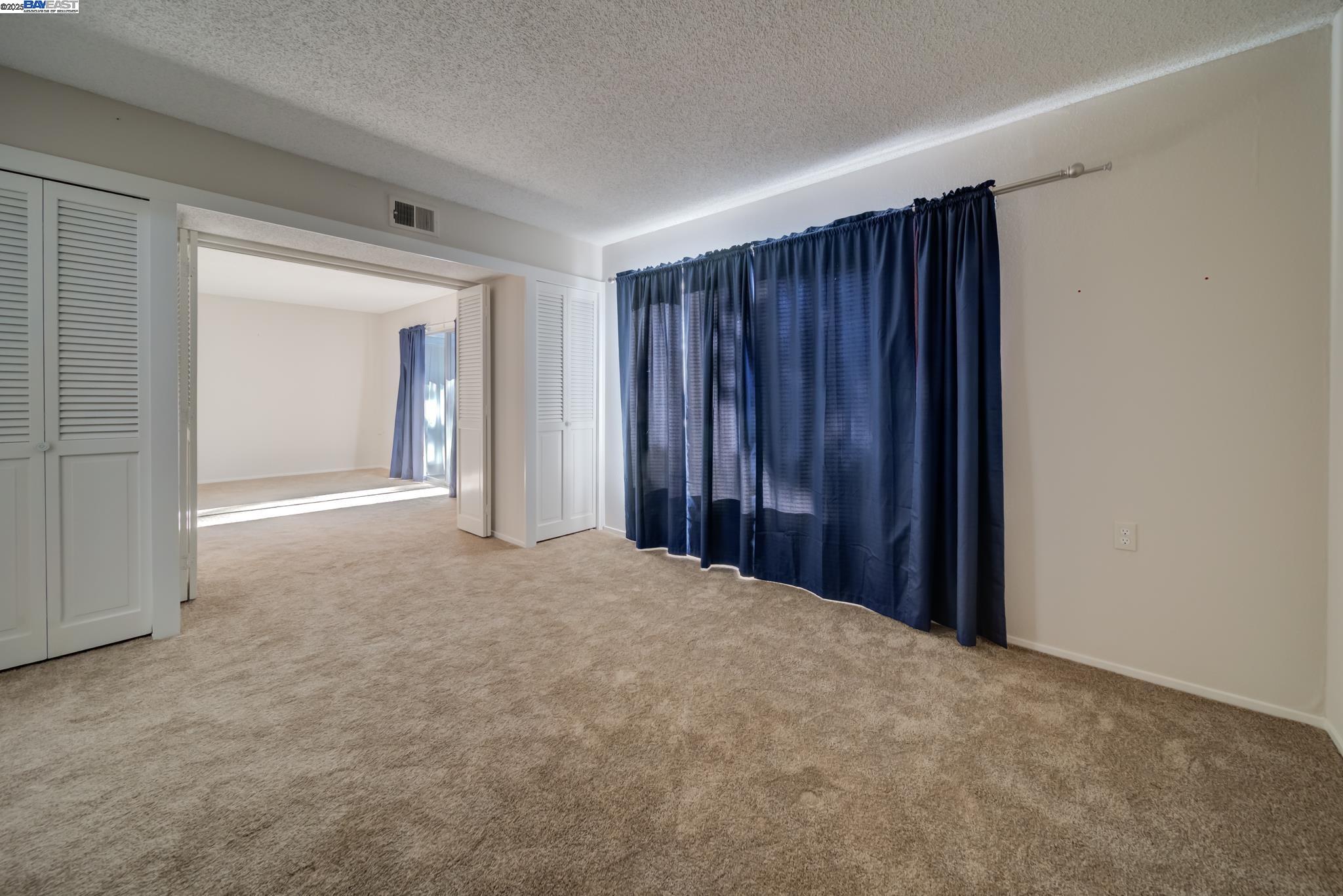 1708 Golden Rain Road, Unit 3 Walnut Creek, CA 94595 - Photo 19 of 23 a view of an empty room and closet area