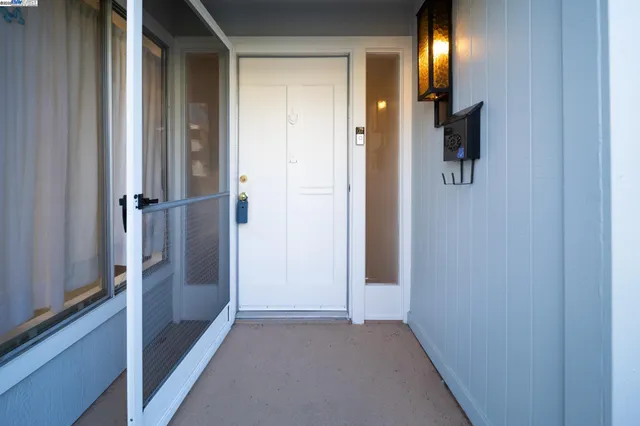a view of hallway with livingroom