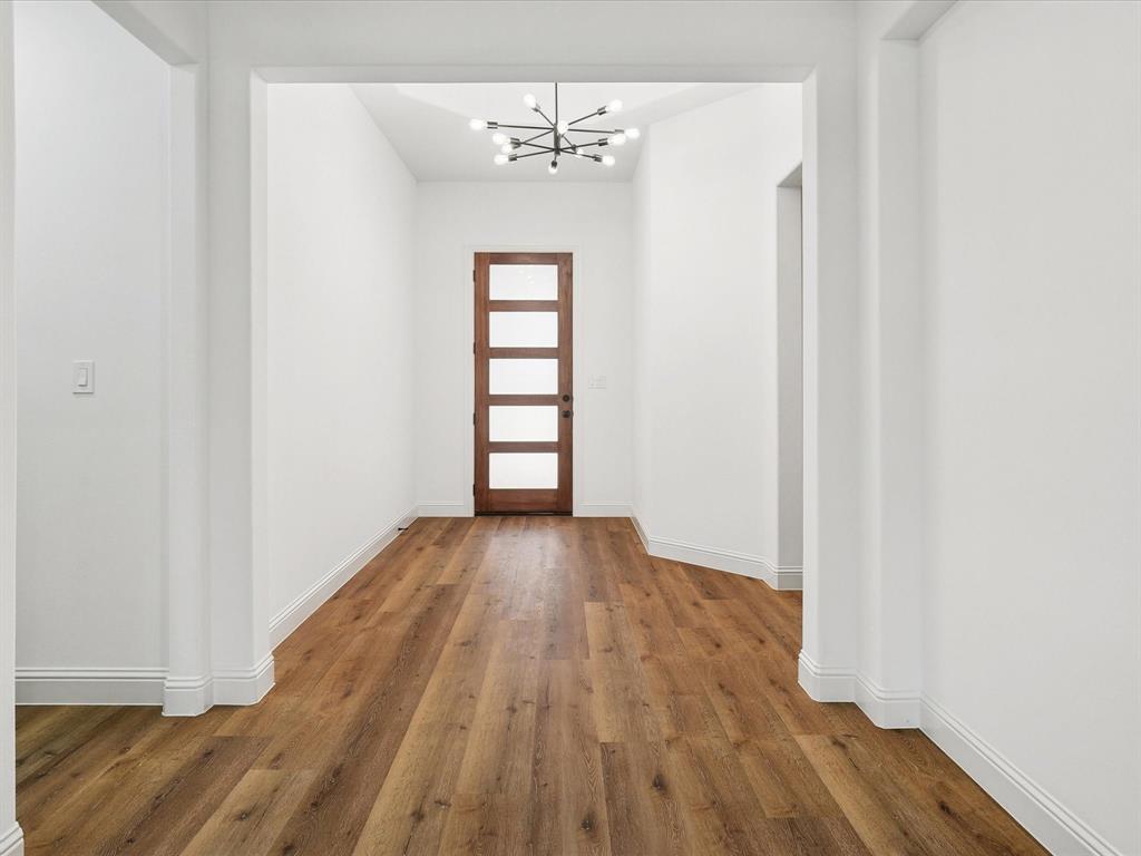 448 Rs County Road Alba, TX 75410 - Photo 6 of 29 wooden floor in an empty room