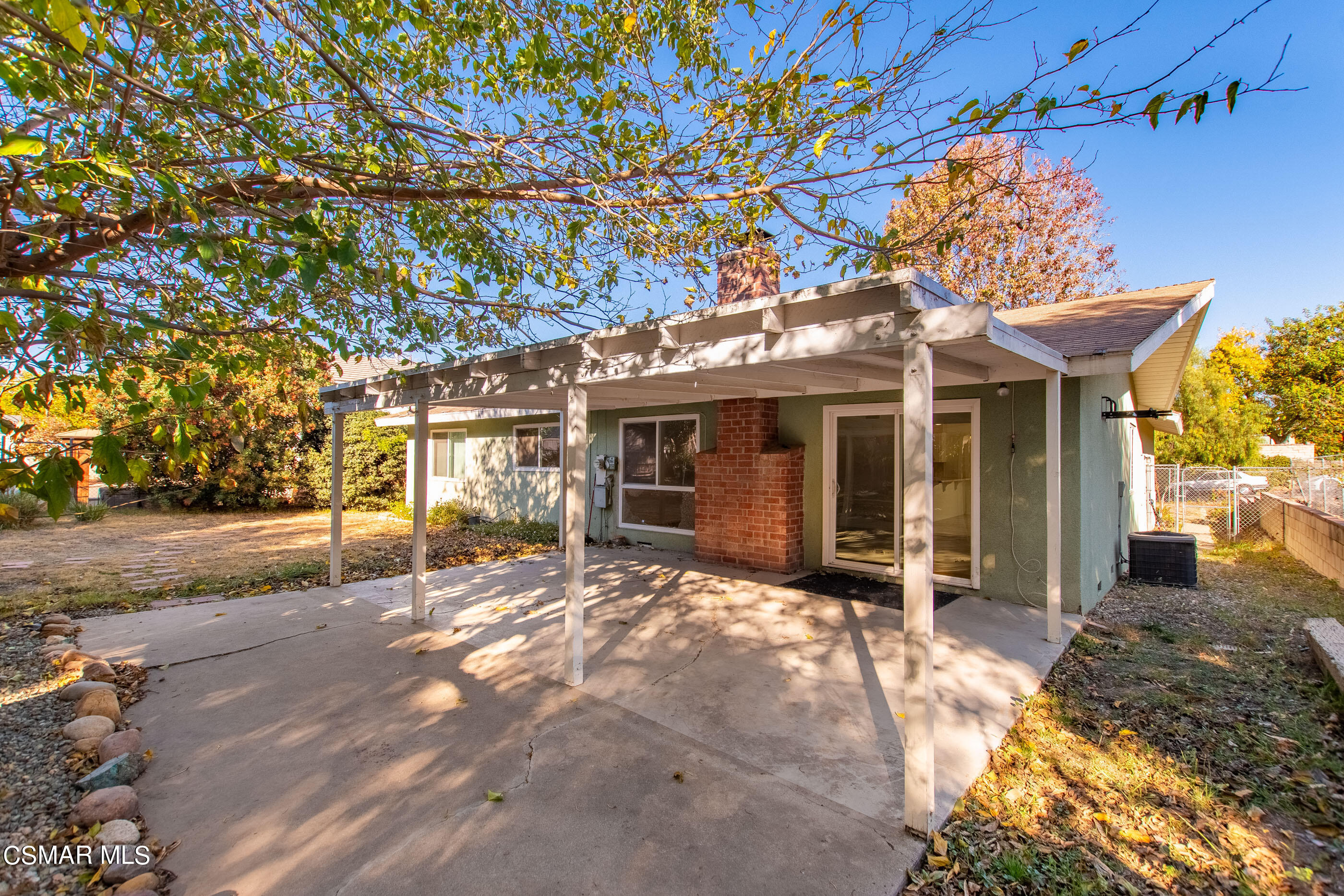 2772 Harrington Road Simi Valley, CA 93065 - Photo 20 of 36 a view of a house with a tree in the background