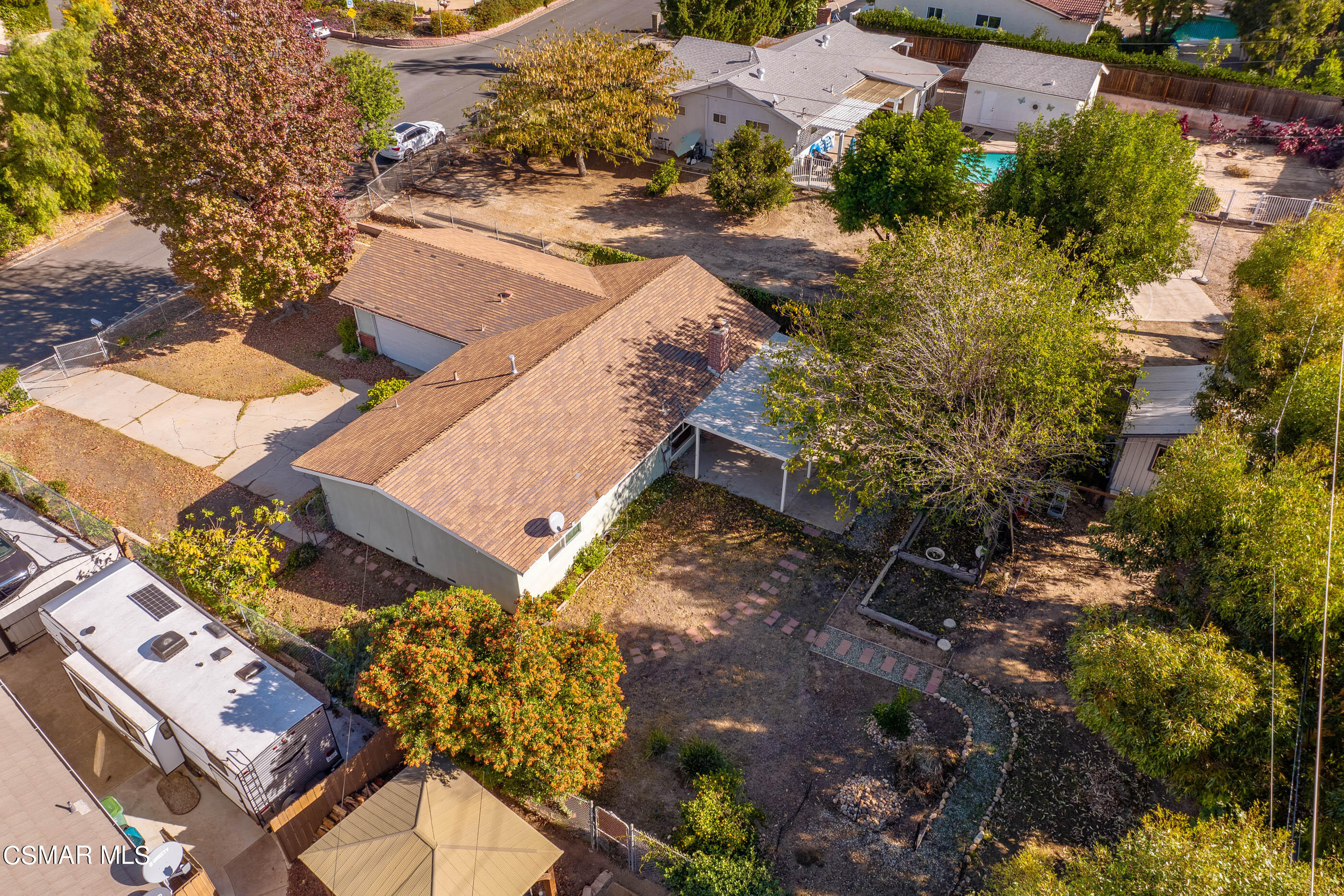2772 Harrington Road Simi Valley, CA 93065 - Photo 31 of 36 a view of a house with a yard and garden