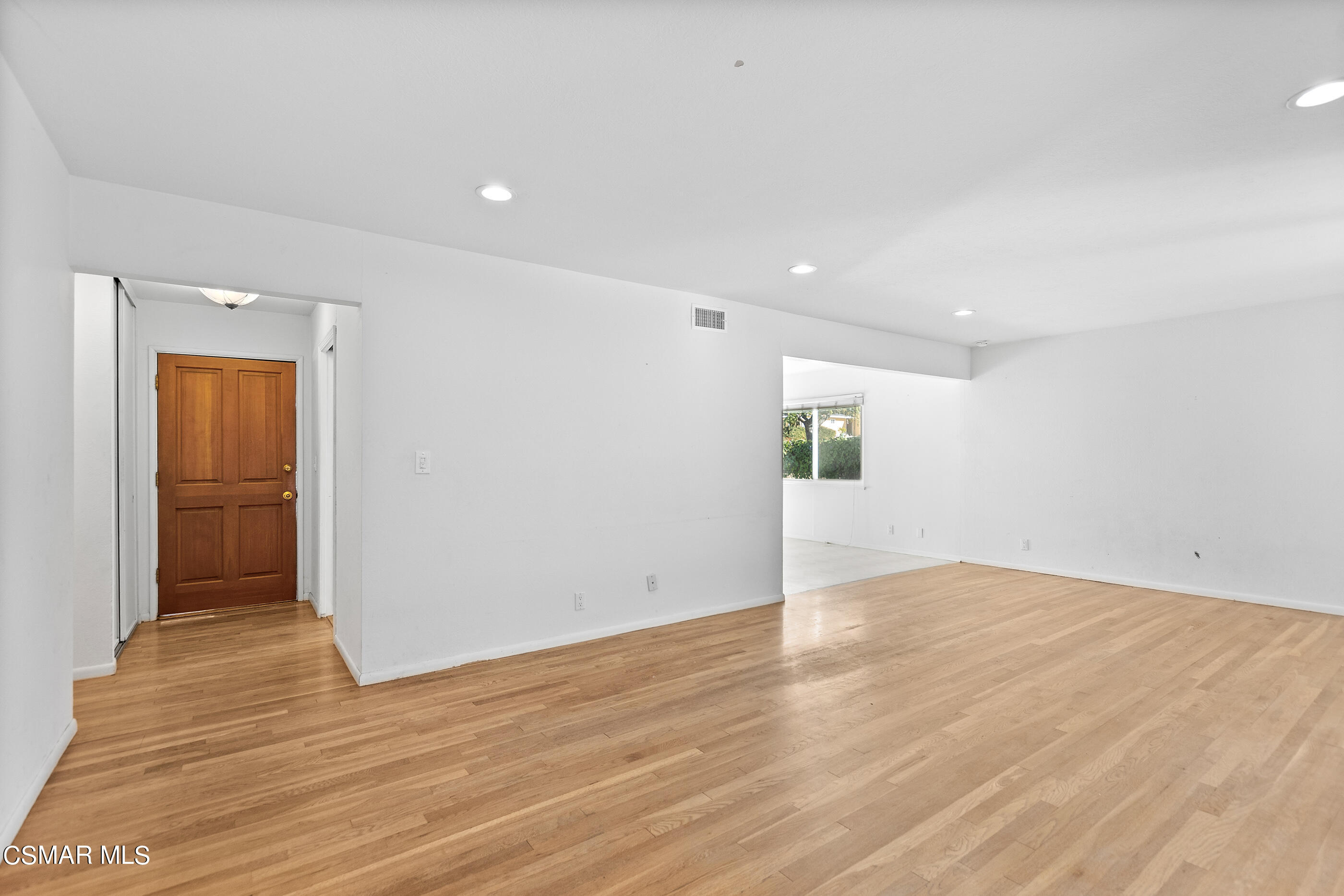 2772 Harrington Road Simi Valley, CA 93065 - Photo 5 of 36 a view of an empty room with wooden floor and closet