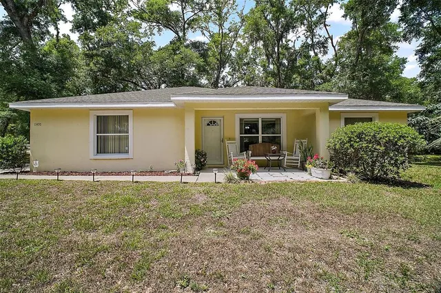 front view of a house with a patio