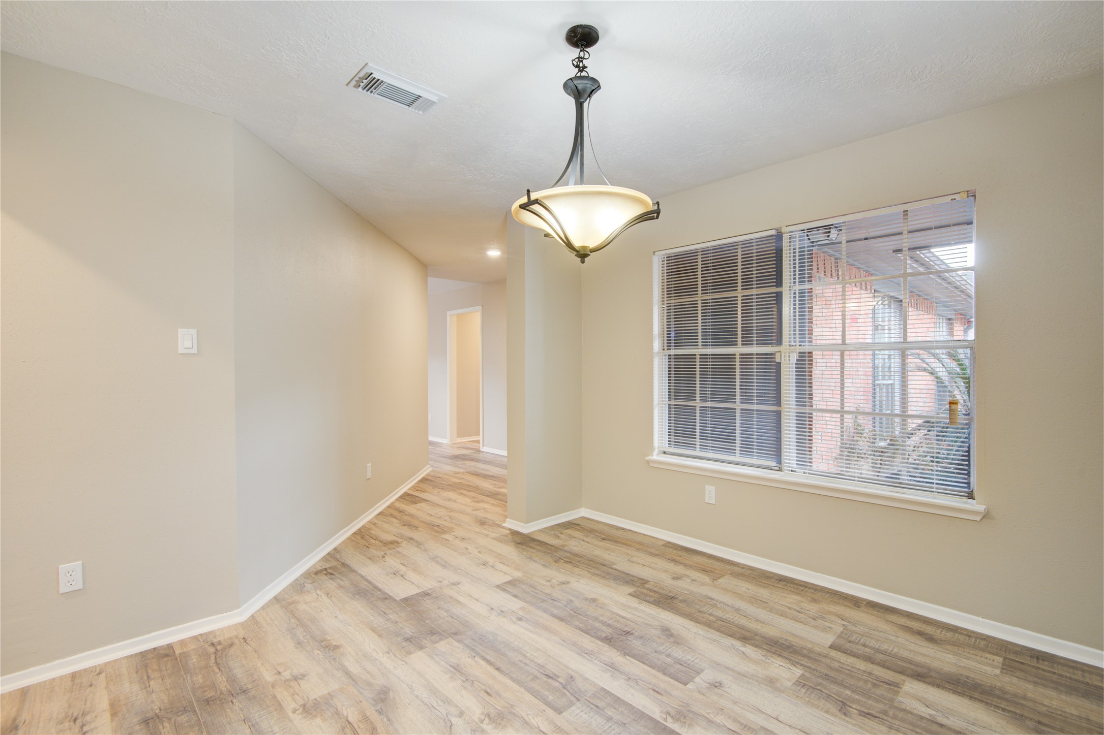 6722 Lynngate Drive Spring, TX 77373 - Photo 13 of 31 a view of an empty room with a window