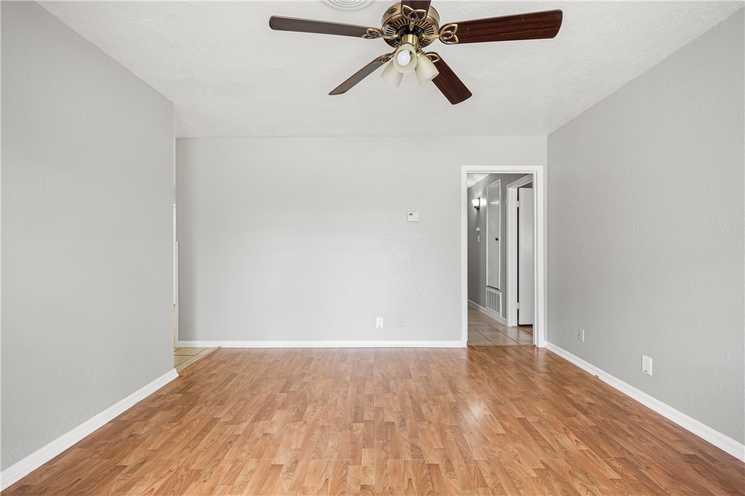 4014 Bray Drive Corpus Christi, TX 78413 - Photo 14 of 20 wooden floor in an empty room