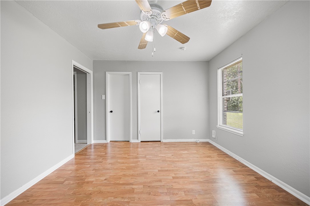 4014 Bray Drive Corpus Christi, TX 78413 - Photo 17 of 20 a view of an empty room with window and chandelier fan