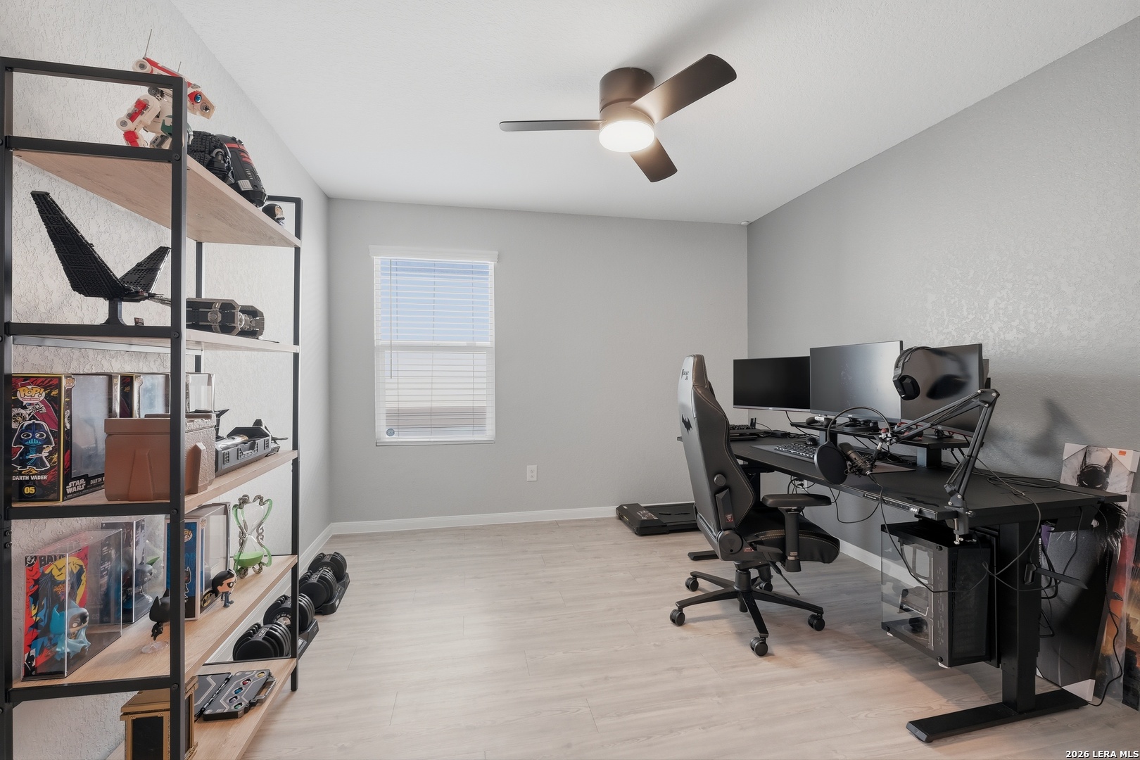31589 Untrodden Way Bulverde, TX 78163 - Photo 20 of 26 a view of a workspace with furniture and a window