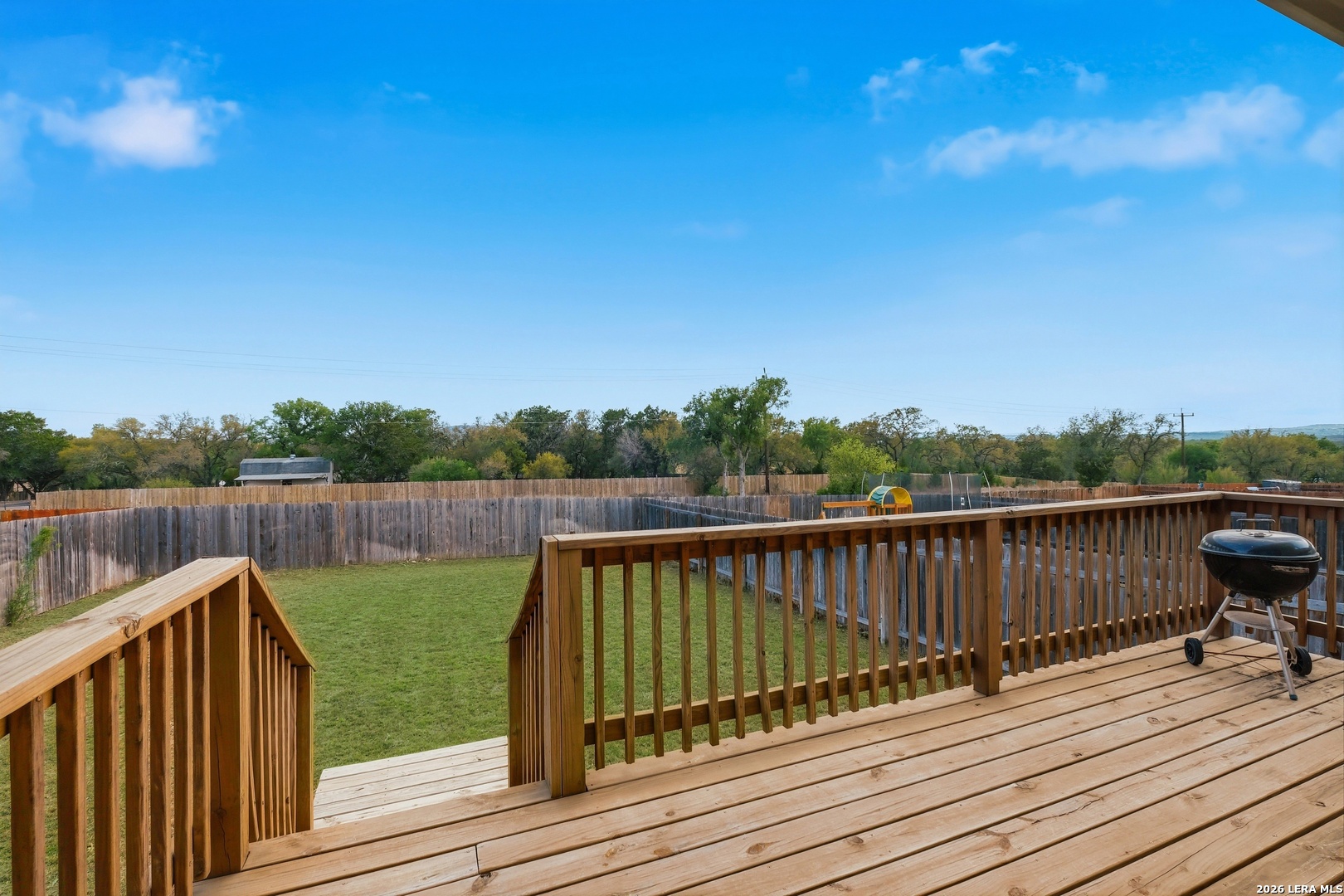 31589 Untrodden Way Bulverde, TX 78163 - Photo 24 of 26 a view of deck with a tennis court