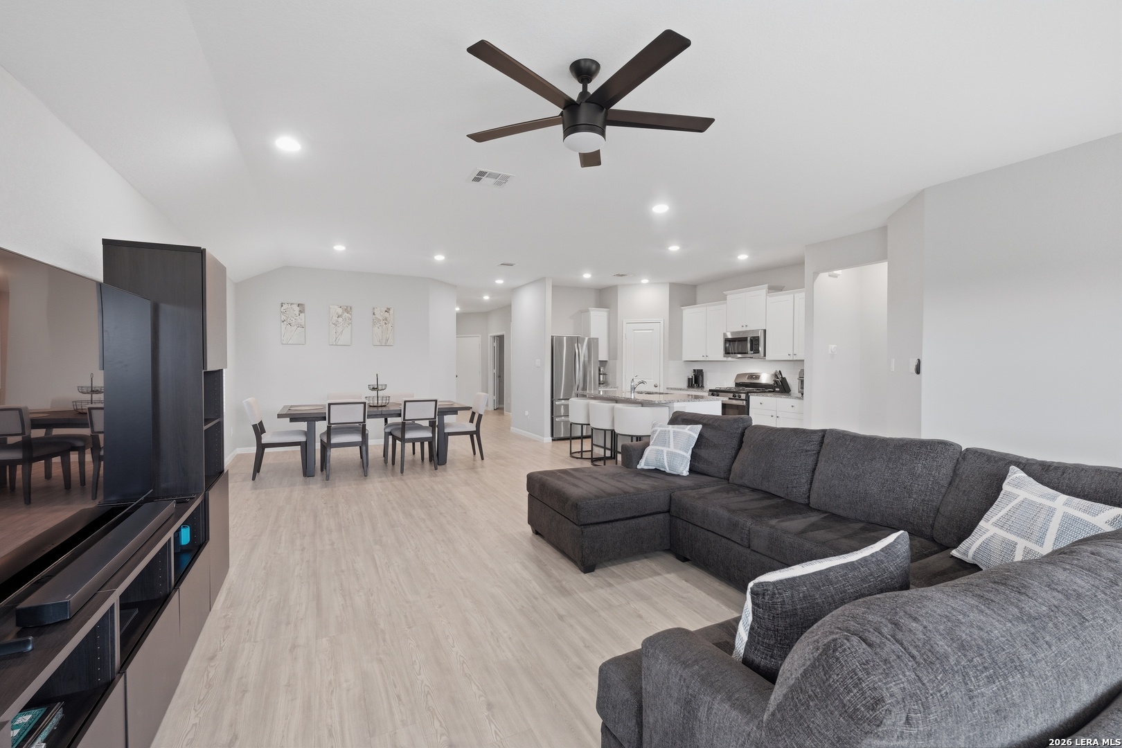 31589 Untrodden Way Bulverde, TX 78163 - Photo 7 of 26 a dining room with furniture and kitchen view