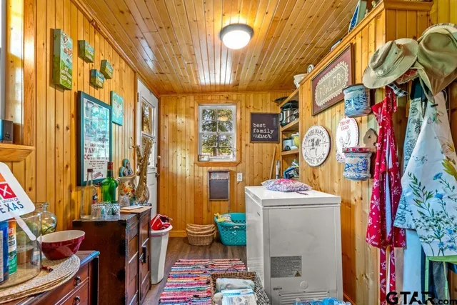 a utility room with lots of stuff and furniture