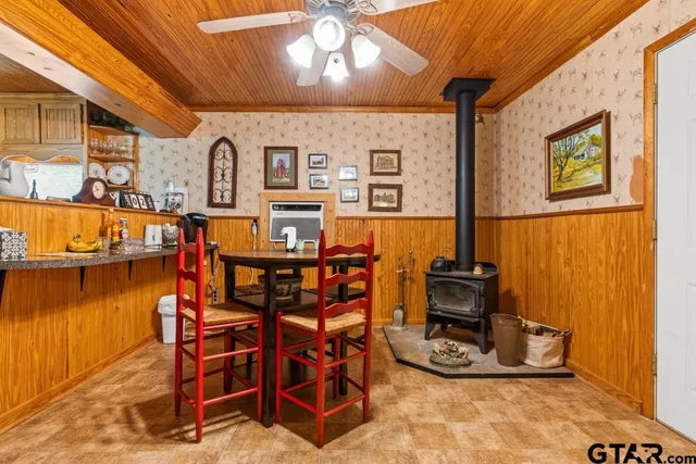 a view of a chairs and table in a patio