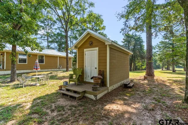 a view of the street with cars