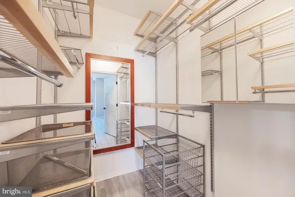 a view of a balcony with wooden floor