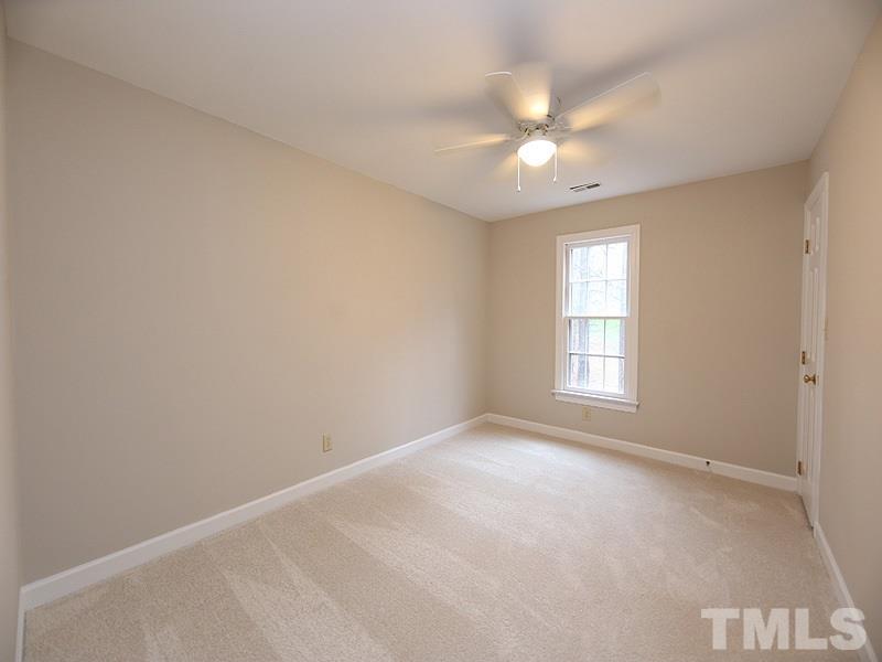 11957 Eagle Cliff Court Raleigh, NC 27613 - Photo 17 of 25 wooden floor in an empty room with a window