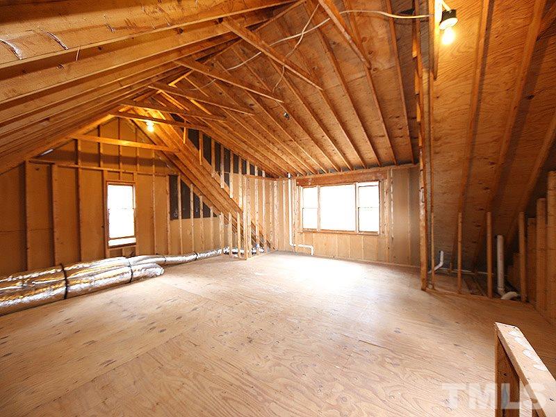 11957 Eagle Cliff Court Raleigh, NC 27613 - Photo 23 of 25 an empty room with windows