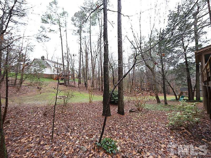 11957 Eagle Cliff Court Raleigh, NC 27613 - Photo 24 of 25 a view of a backyard