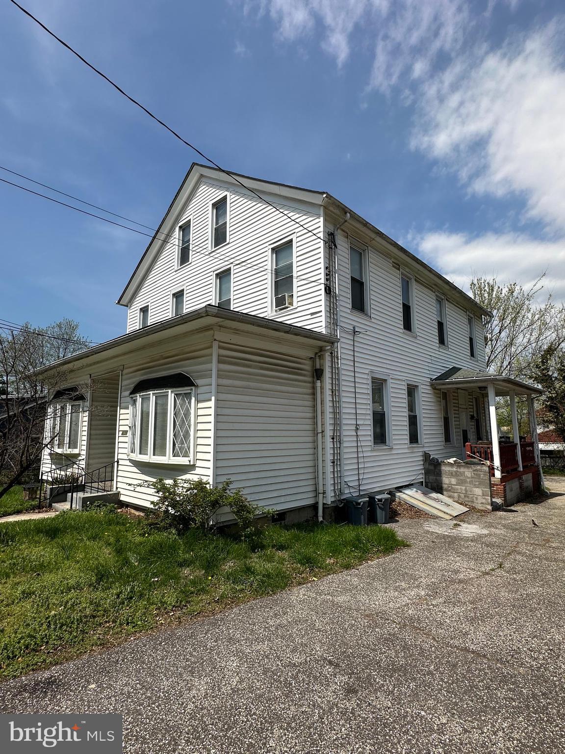4606 Ridge Avenue Halethorpe, MD 21227 - Photo 3 of 11 a front view of a house with garden