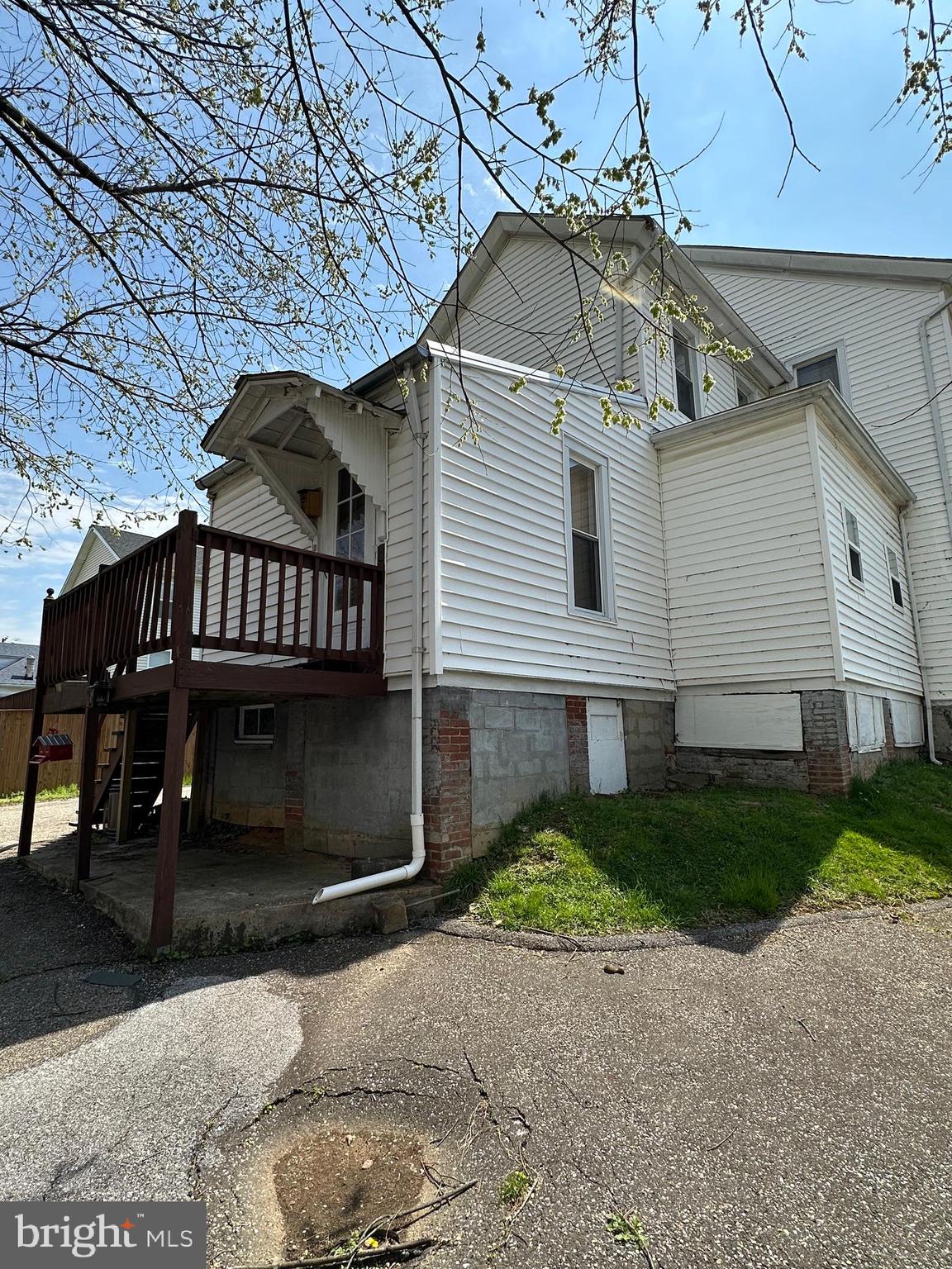 4606 Ridge Avenue Halethorpe, MD 21227 - Photo 5 of 11 a view of a house with a yard