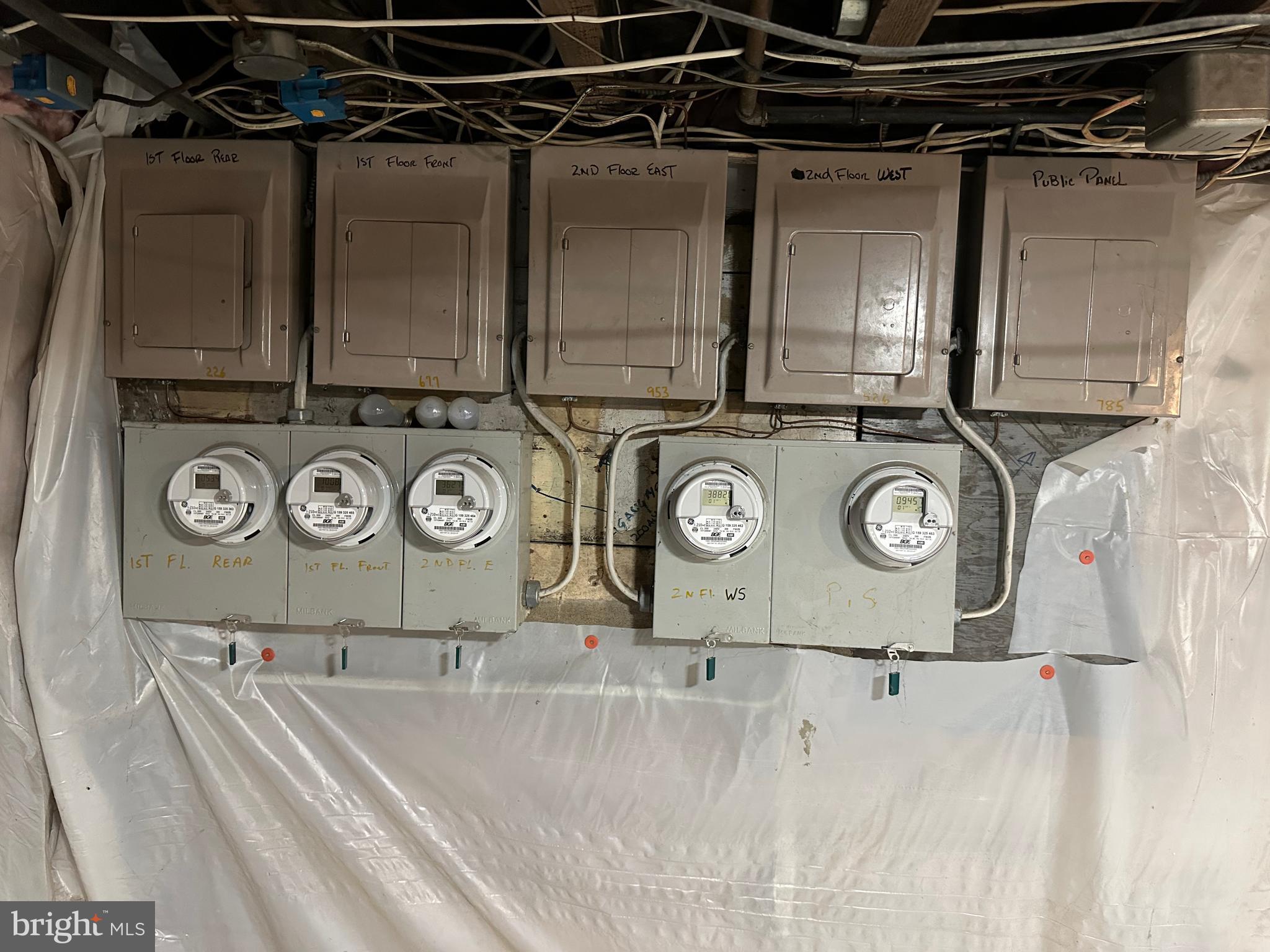 4606 Ridge Avenue Halethorpe, MD 21227 - Photo 8 of 11 a utility room with dryer and washer