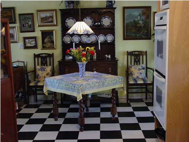 1920 Co Road North Santa Rosa Beach, FL 32459 - Photo 2 of 13 a dining room with a table and chairs