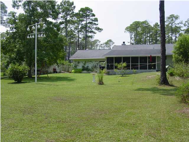 1920 Co Road North Santa Rosa Beach, FL 32459 - Photo 11 of 13 a view of a house with backyard