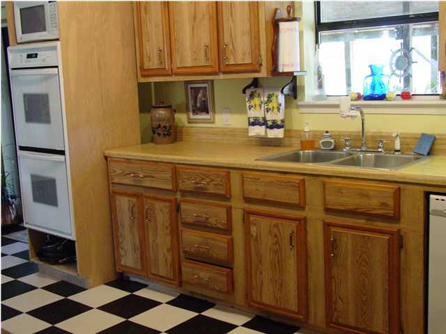 1920 Co Road North Santa Rosa Beach, FL 32459 - Photo 3 of 13 a kitchen with stainless steel appliances a refrigerator and cabinets