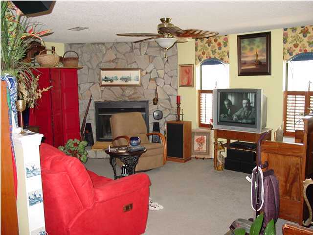 1920 Co Road North Santa Rosa Beach, FL 32459 - Photo 6 of 13 a living room with furniture and a flat screen tv