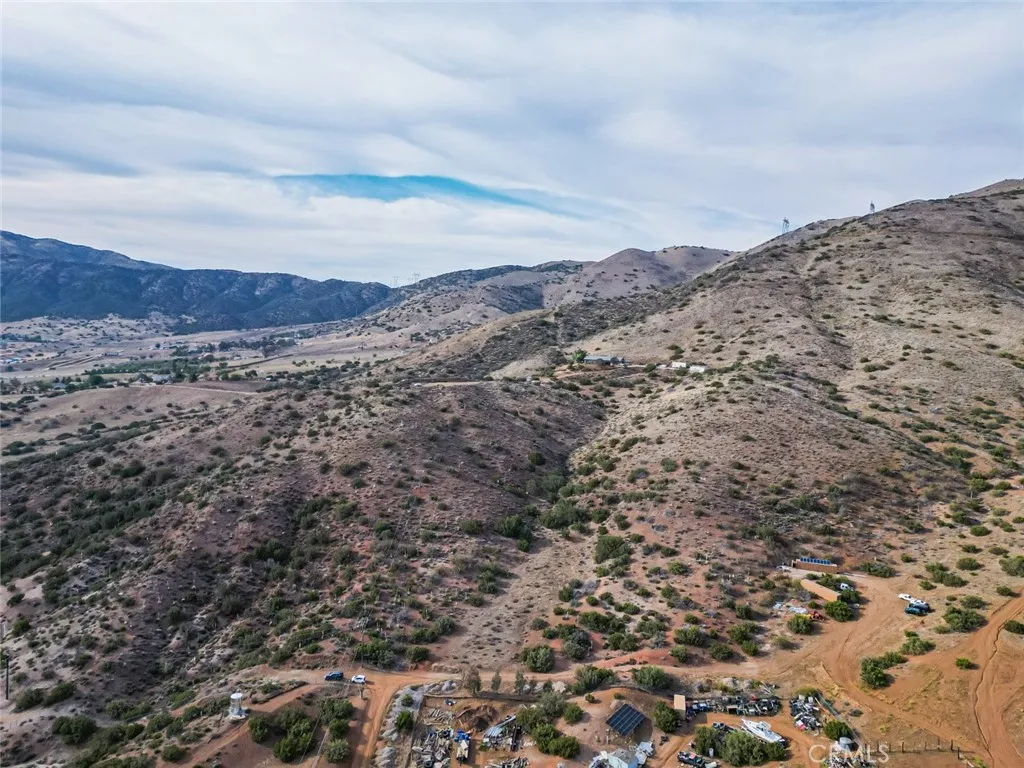 0 Dwight Lee Street Acton, CA 93510 - Photo 23 of 40 a view of a dry yard with mountains in the background