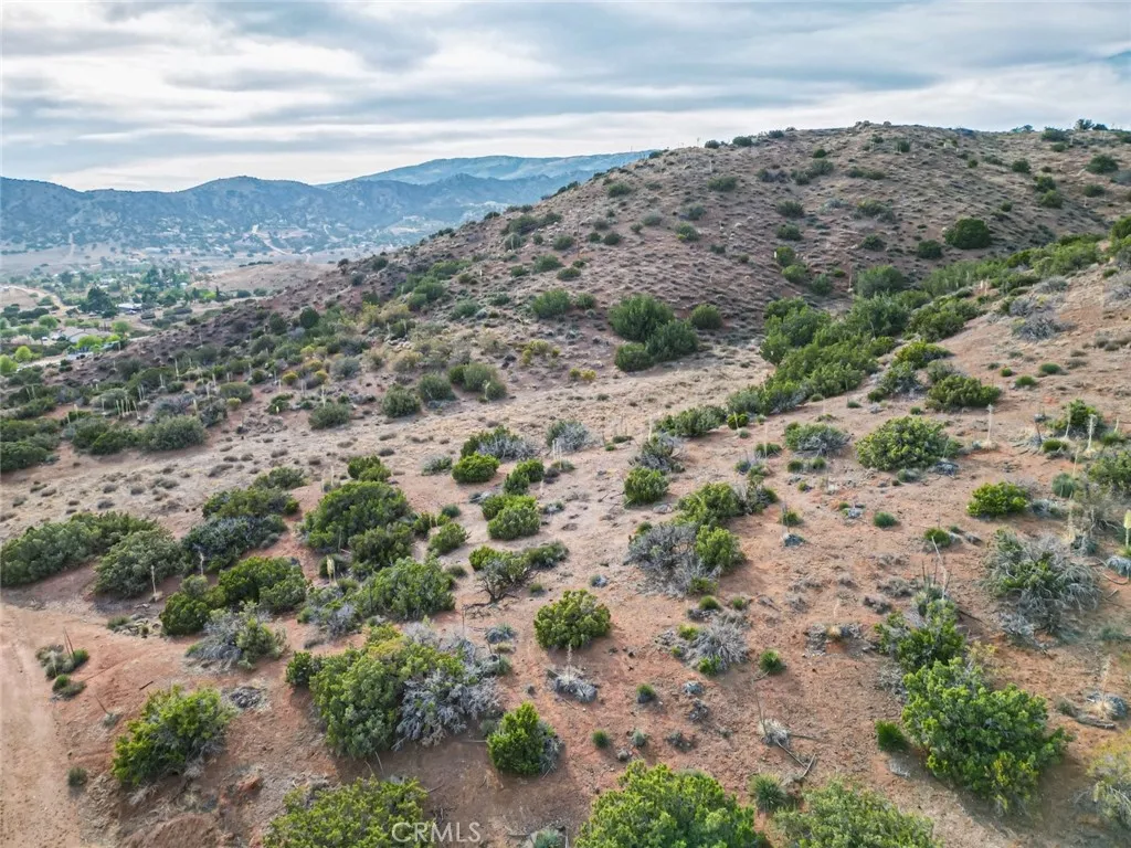0 Dwight Lee Street Acton, CA 93510 - Photo 27 of 40 a view of a dry field with mountains in the background