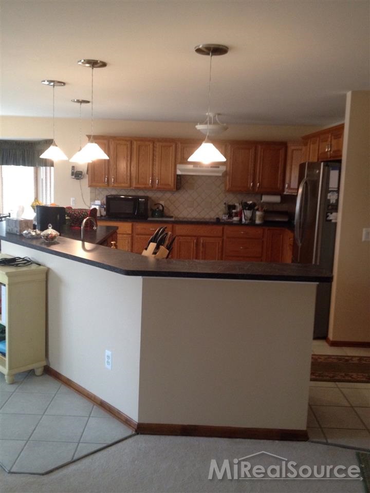 63863 Inverness Washington, MI 48095 - Photo 7 of 16 Kitchen Island