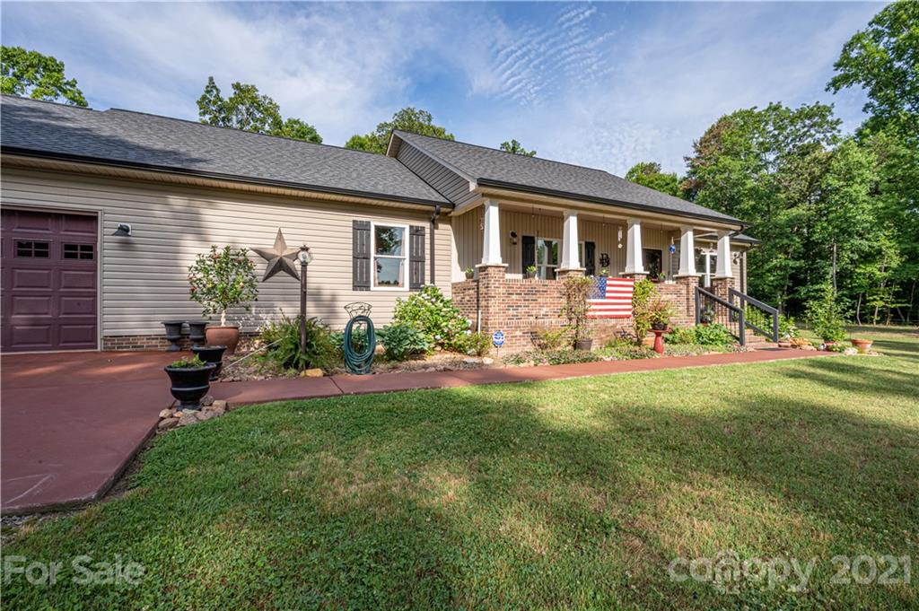 4773 Grigg Road Lincolnton, NC 28092 - Photo 3 of 34 a front view of house with yard and outdoor seating