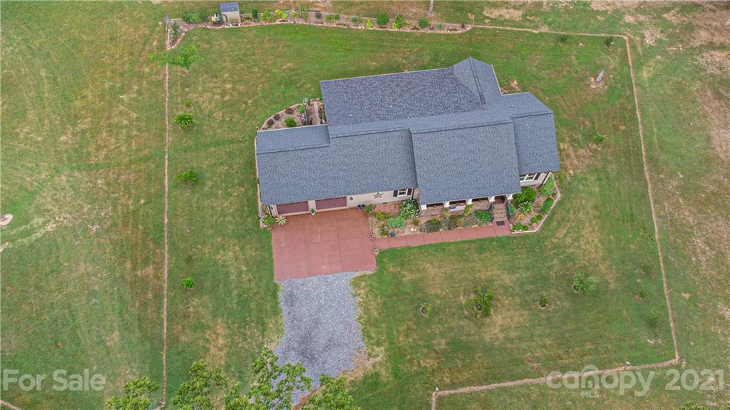 4773 Grigg Road Lincolnton, NC 28092 - Photo 27 of 34 a view of a house with a yard