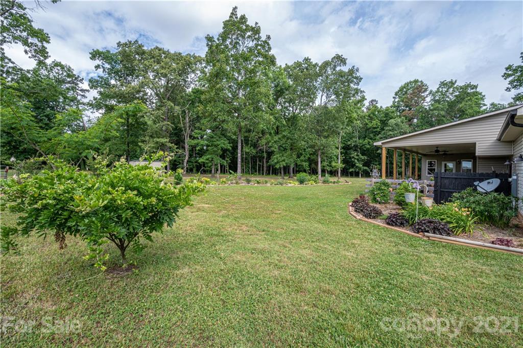 4773 Grigg Road Lincolnton, NC 28092 - Photo 28 of 34 a view of a house with a backyard