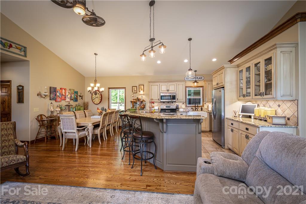 4773 Grigg Road Lincolnton, NC 28092 - Photo 5 of 34 a large kitchen with a table and chairs