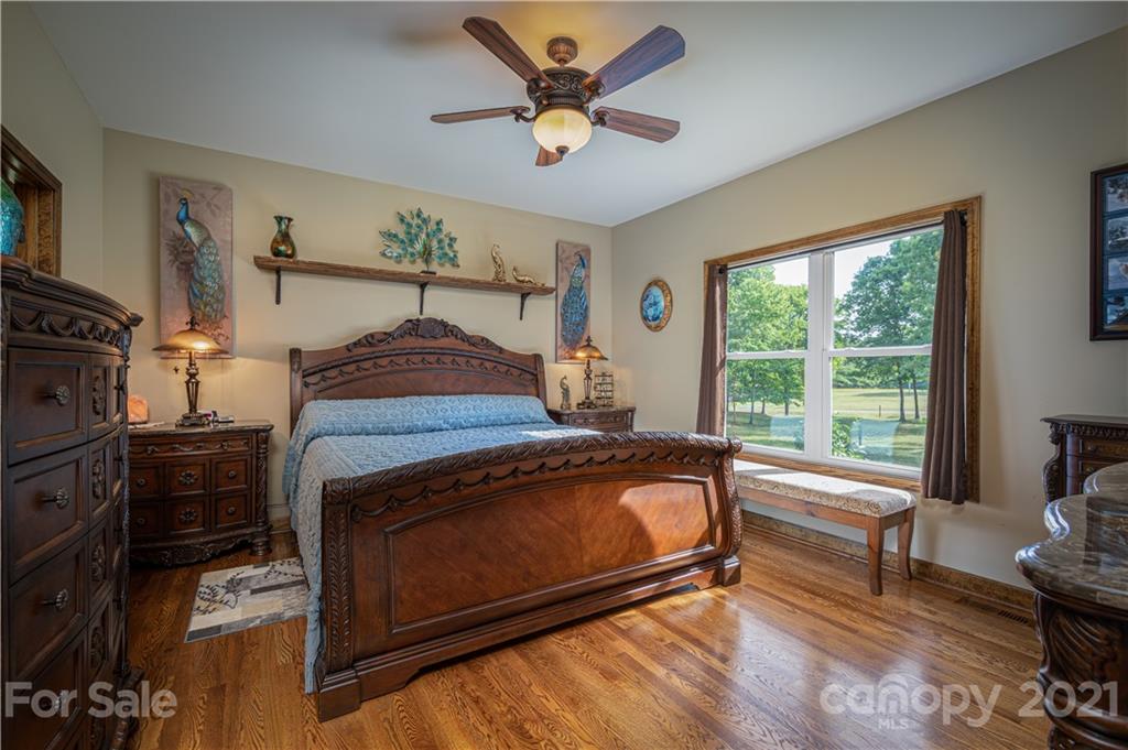 4773 Grigg Road Lincolnton, NC 28092 - Photo 10 of 34 a bedroom with furniture and a window