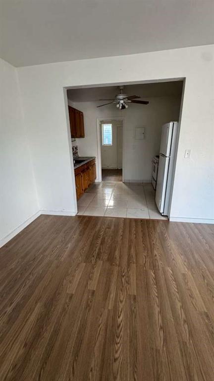 750 83rd Street, Unit 3 Miami Beach, FL 33141 - Photo 15 of 31 a view of empty room with wooden floor and window
