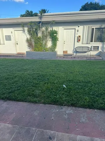 a house view with a outdoor space