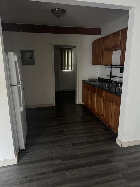 750 83rd Street, Unit 3 Miami Beach, FL 33141 - Photo 26 of 31 a kitchen with granite countertop a refrigerator and a sink