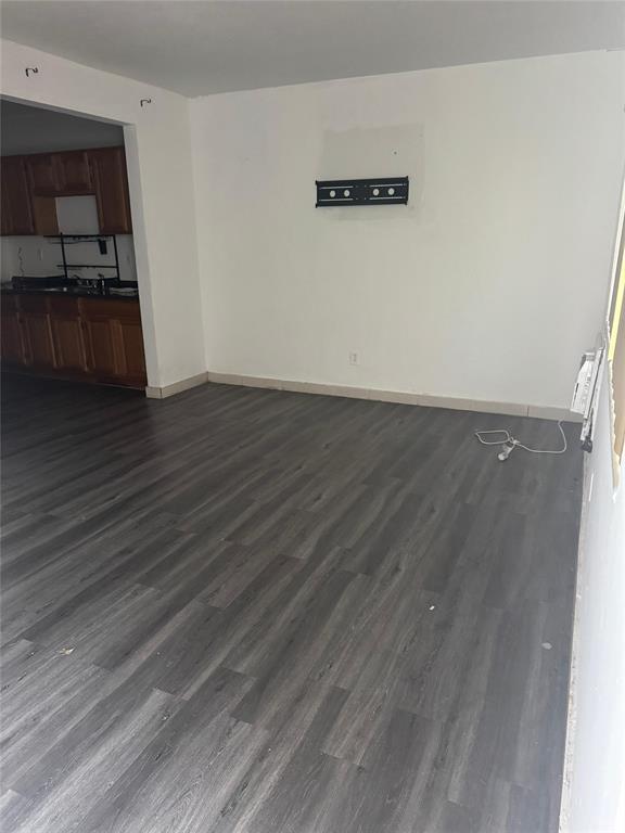 750 83rd Street, Unit 3 Miami Beach, FL 33141 - Photo 28 of 31 wooden floor in an empty room